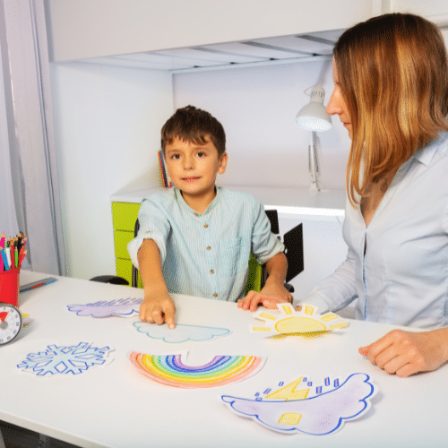 an autistic kid is accompanied by an aba therapist